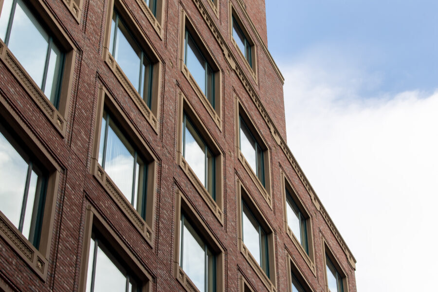 A building facade reflected in glass
