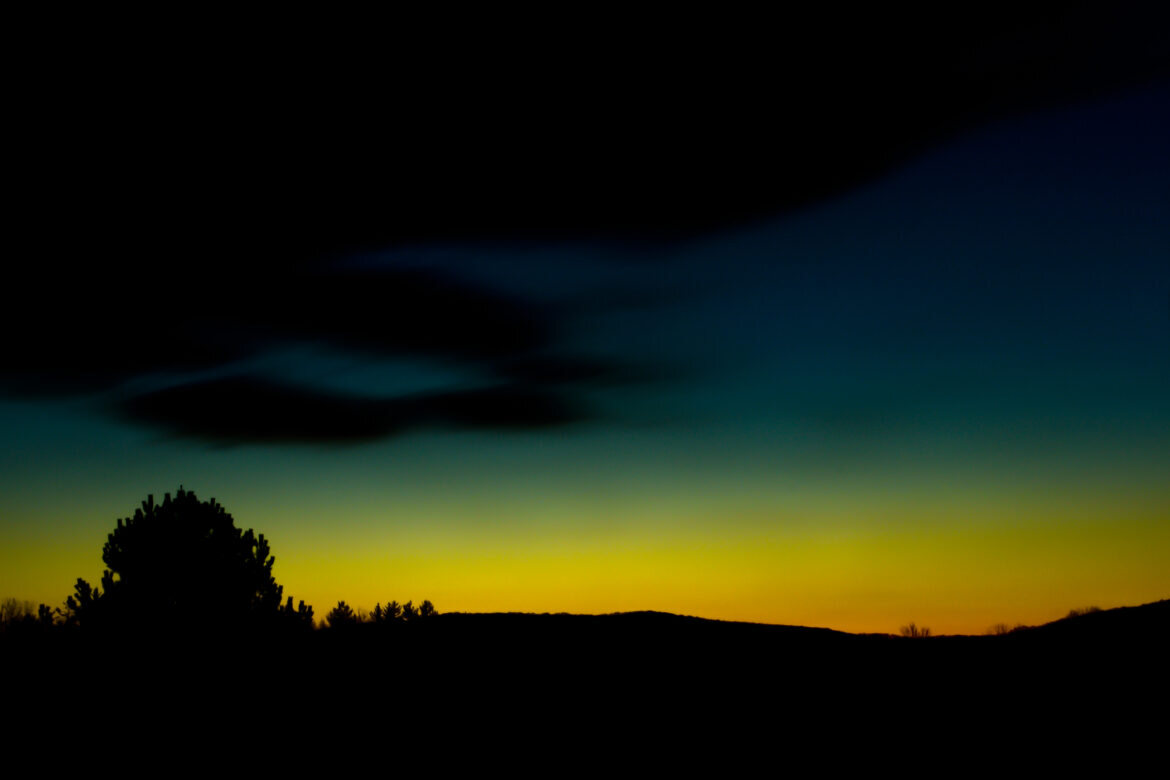 Clouds drifting across a night sky