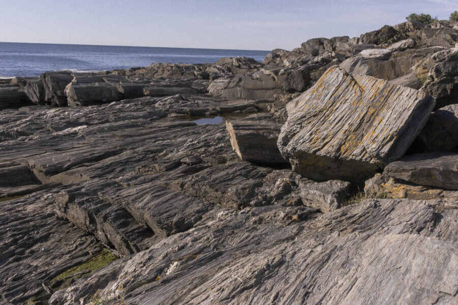 Rocky coastline under an overcast sky