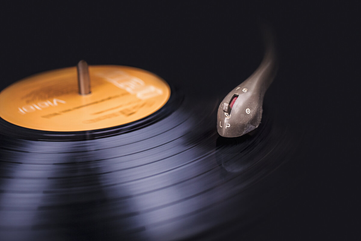 A vinyl record spinning on a turntable